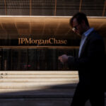 JPMorgan Chase headquarters in New York representing JPMorgan Q3 earnings, rising profit, surging equities trading, weaker FICC revenue, consumer banking strength and lower share buybacks
