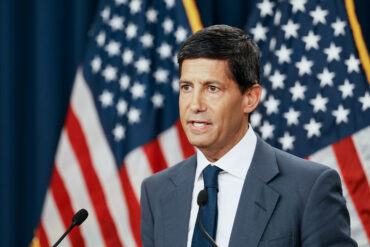 Federal Reserve Chair Kevin Warsh representing the Fed rate decision, 3.75%–4% interest rates, inflation policy, Treasury yields and the outlook for a December rate hike