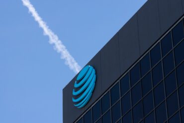 AT&T office representing AT&T Q3 earnings, record fiber growth, wireless performance, 2026 guidance, free cash flow and rising net debt