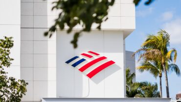Bank of America office representing Bank of America Q3 earnings, the $1.2 billion AML fine, stronger net interest income, loan growth and trading performance
